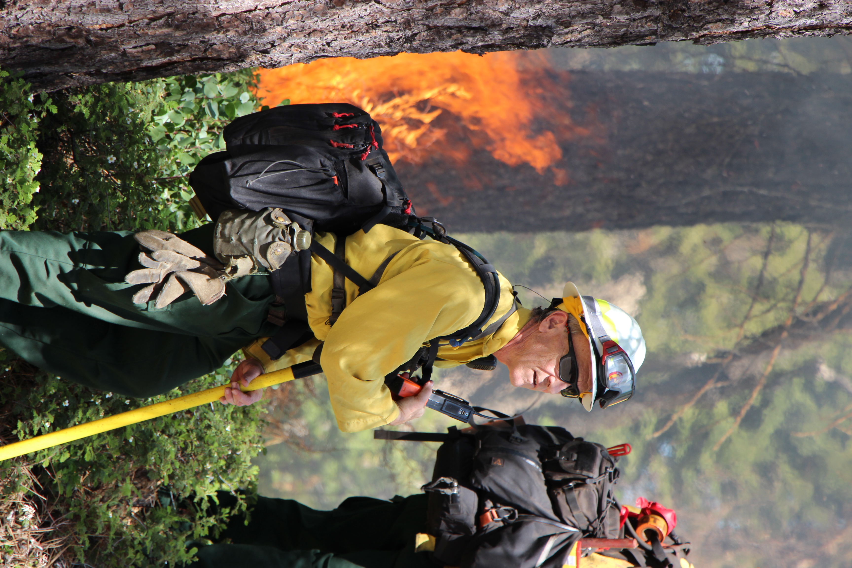 Fight fighter standing in a white helmet. 